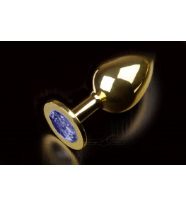Большая золотая анальная пробка с закругленным кончиком и синим кристаллом - 9 см.