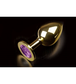 Большая золотая анальная пробка с закругленным кончиком и фиолетовым кристаллом - 9 см.